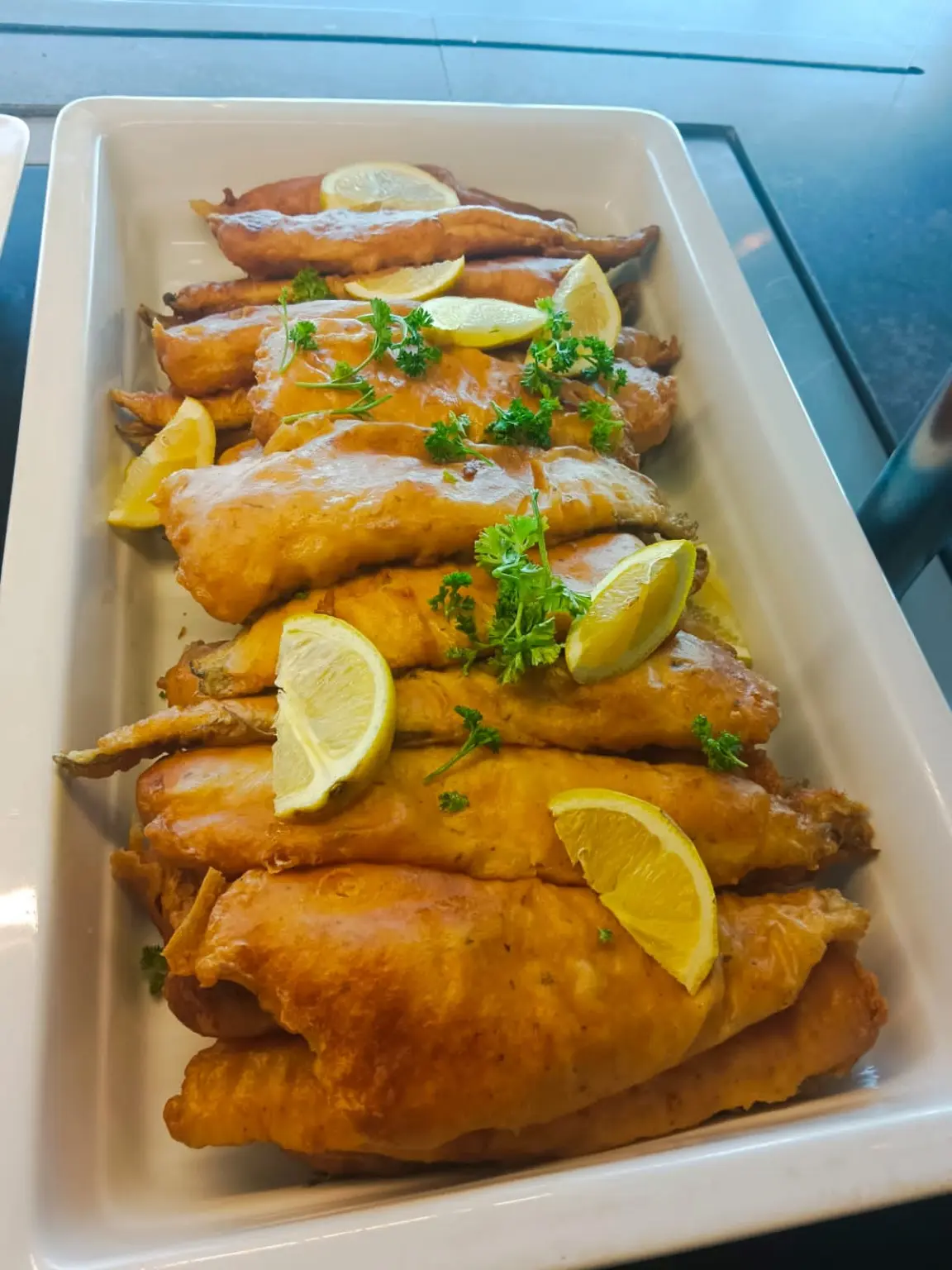 Golden fish fillets with fresh lemon