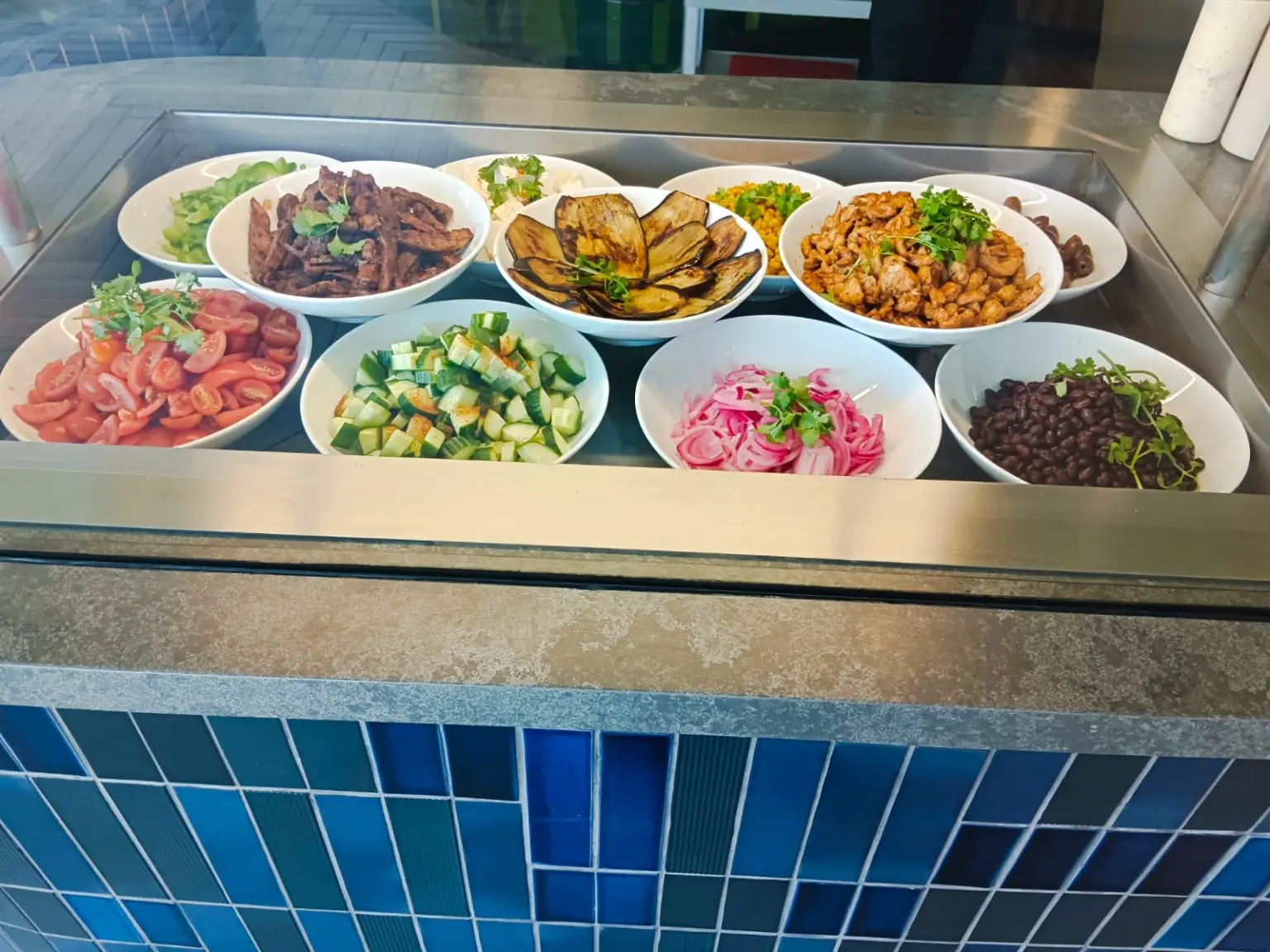 A colourful workplace salad and grain bar